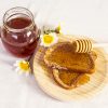 delicious-bread-honey-wooden-plate